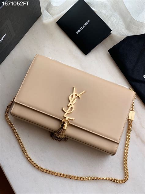 ysl beige tote|YSL beige bag with tassel.